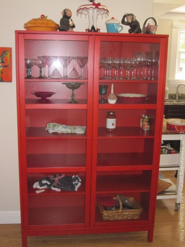 Red freestanding pantry.