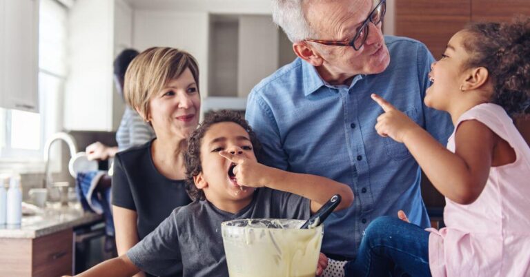 Grandparents with grandkids, baking together.