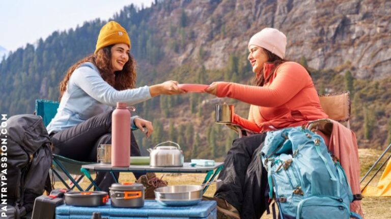 Two female hikers enjoying dehydrated keto meals.