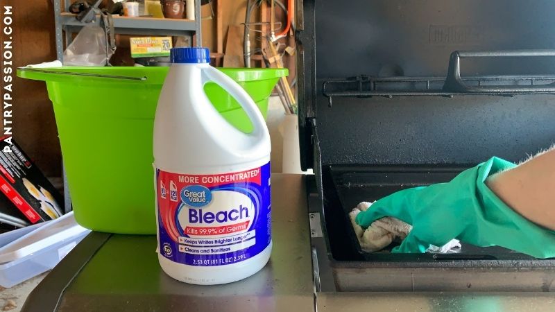 Disinfecting a grill with bleach after mice have been in it.